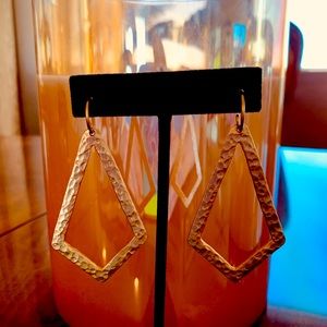 Gold tone earring 3” length